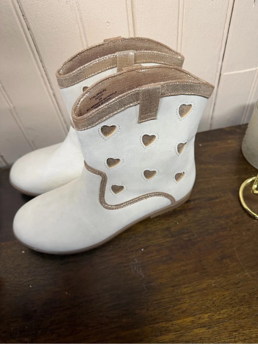 Tucker + Tate White Boots with Rose Gold Trim and Heart Cutouts